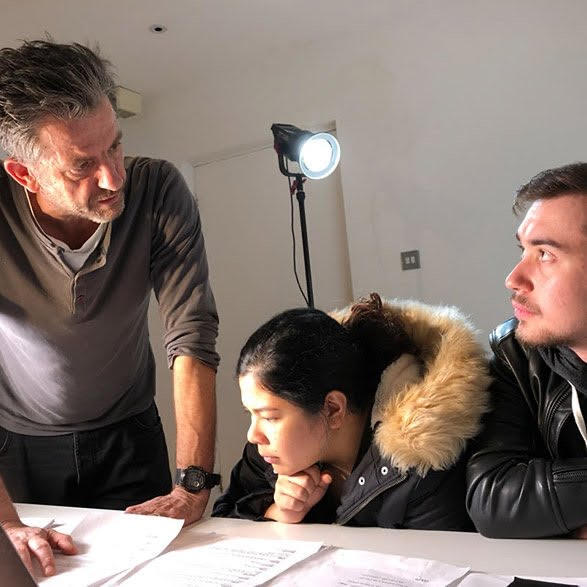 Steve North with two film students